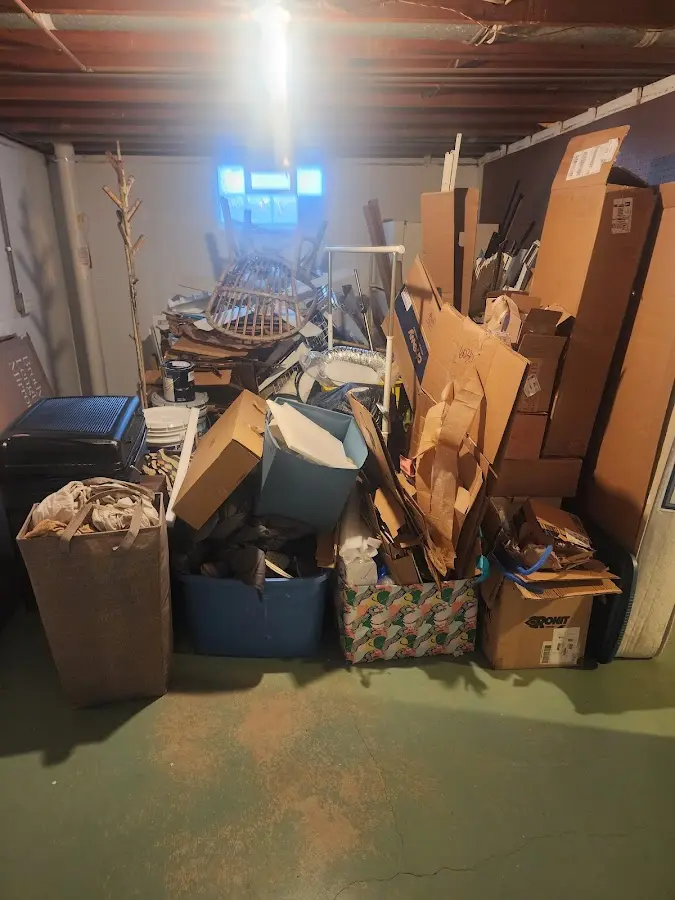 Roll-off dumpster container at job site for Cleanout Dumpster Rental in Elfers